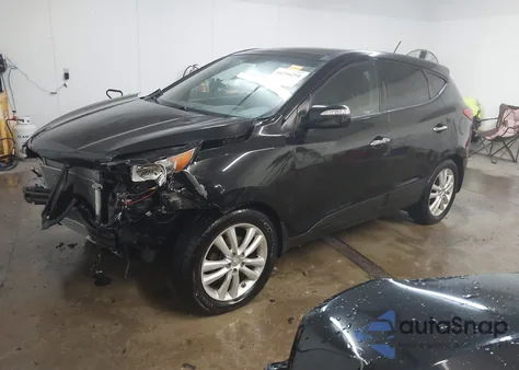 2013 Hyundai Tucson Limited z USA, uszkodzony, nr VIN KM8JUCACXDU576255